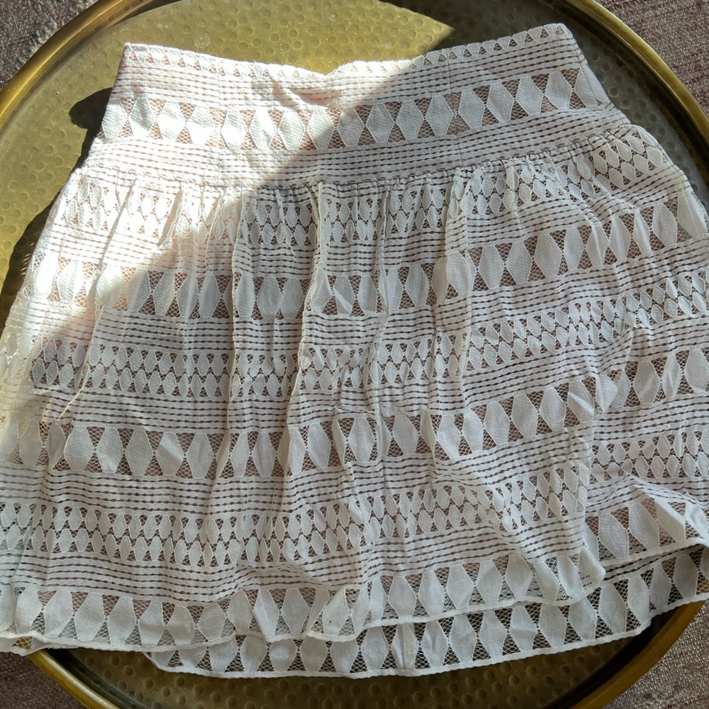 BCBG white lace mini skirt